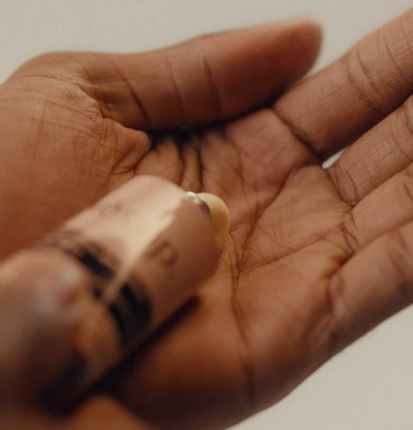 Hand balm product placed on a hand